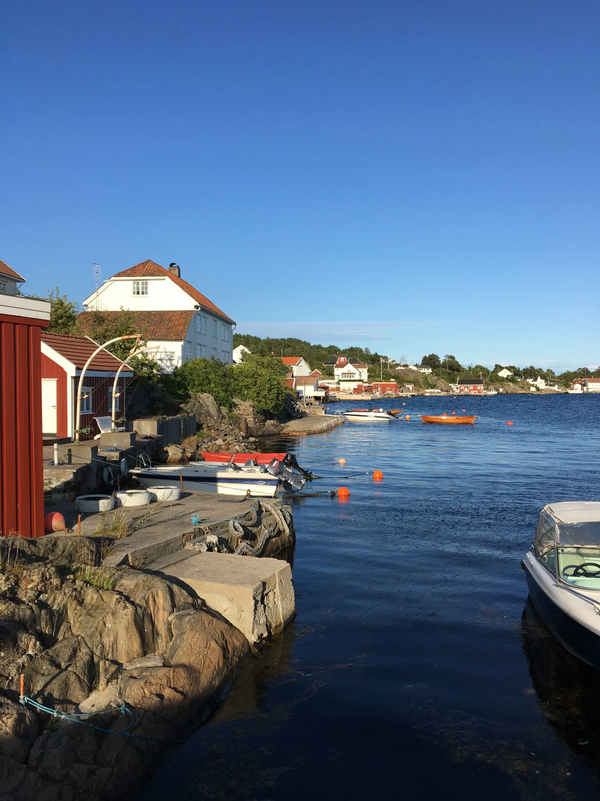 Smooth rocks and small boats in the skerries outside Arendal