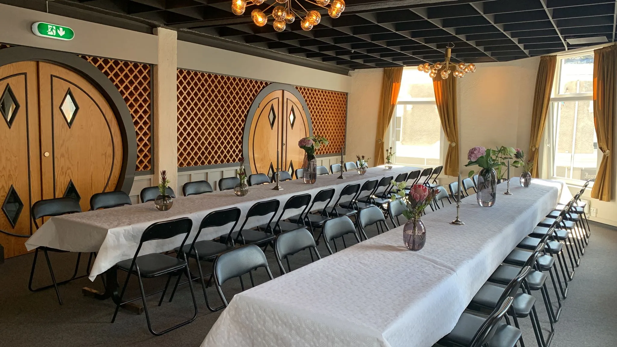 A long table set for a party in Hall 1