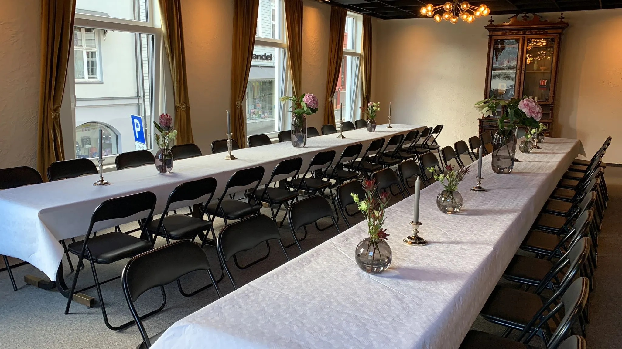 Hall 2 with tables and chairs arranged in groups